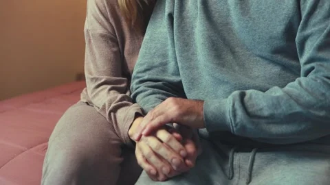 Couple sharing tender moment, displaying deep emotional connection while si.. Stock Footage 303996751
