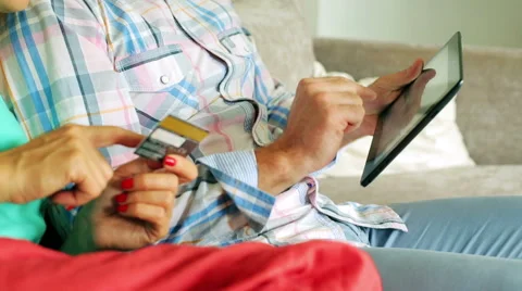 Couple shopping online and using credit card Stock-Footage 43238908