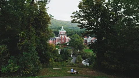 Couple Sit on Bench Observing View Stock Footage 130164469