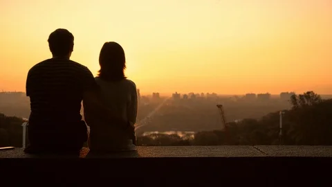Couple sits at the observation deck Stock Footage 95206199