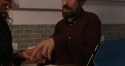 Couple sitting and thinking over blueprint 動画素材 194421139