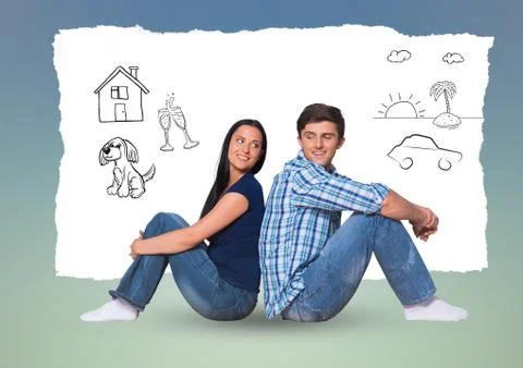 Couple sitting back to back with hand drawn graphics against blue background 写真素材