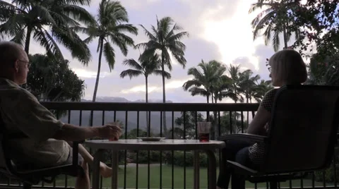 Couple sitting on balcony Stock Footage 35194606