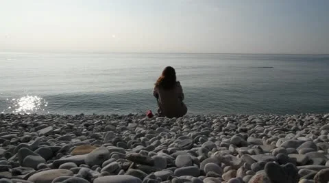 Couple Sitting on the Beach Stock-Footage 18139814