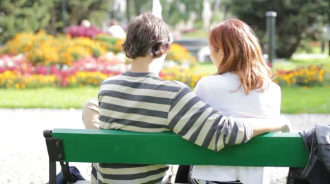 Couple sitting on the bench. Stock Footage 1075762