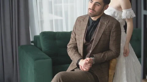 Couple sitting on the sofa Stock Footage 147729760