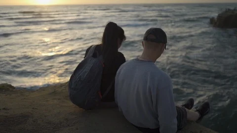 Couple Sitting on Sunset Cliffs [1] 1080p/120fps Stock Footage
