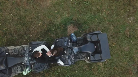 Couple sitting on two ATVs Video stock 121118613