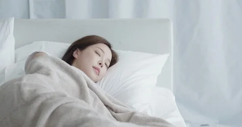 The couple is sleeping in bed Stock Footage 100937600