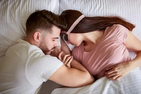 Couple sleeping together Stock Photos