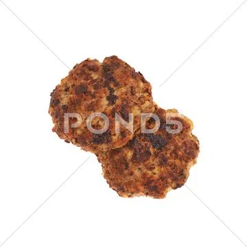 Couple of small hand made cutlets isolated over white background Stock Photos