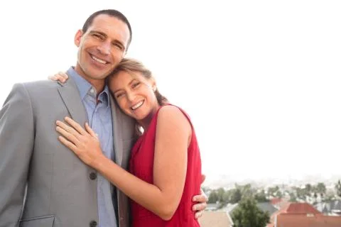Couple smiling at camera Photos