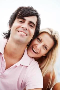 Couple smiling at camera Stock Photos