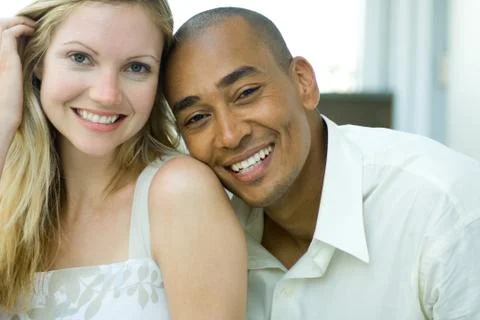 Couple smiling at camera, portrait Stock Photos