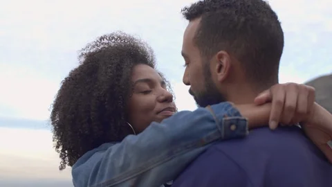 Couple smiling at each other while hugging Video stock 107374565