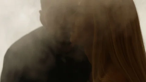 Couple in smoke clouds Stock Footage 81091527
