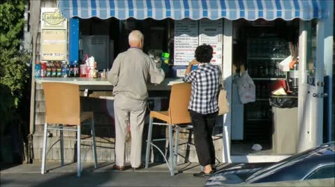 Couple at snackbar order from menu Stock Footage 21056521
