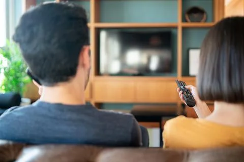 Couple spending time together while staying at home. Stock Photos