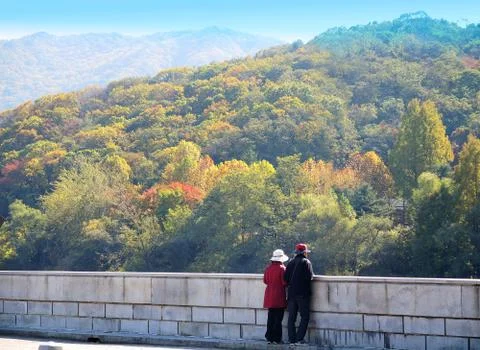Couple stand on the bridge view Stock Photos