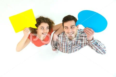 The couple stand with dialog signs. View from above Stock Photos