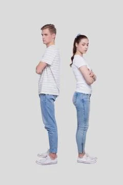 Couple Standing Back to Back after a Fight Isolated. Man and Woman Offended Stock Photos