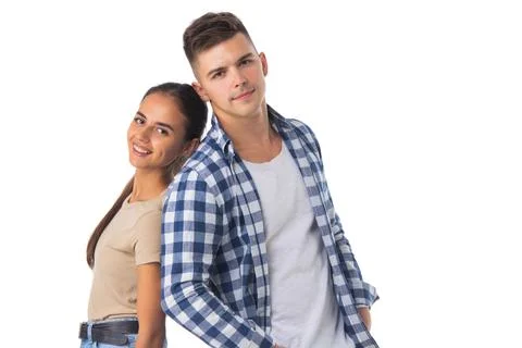 Couple standing back to back Stock Photos