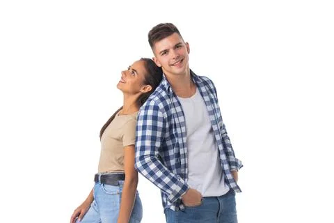 Couple standing back to back Stock Photos