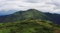 The couple standing on the beautiful green mountain 4k or 4k+ Resolution