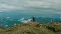 The couple standing on a beautiful green mountain 4k or 4k+ Resolution