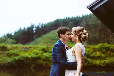 The couple standing on the dock Stock Photos