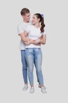 Couple Standing Hugging Looking at Each Other Isolated. Man and Woman Hugging Stock Photos