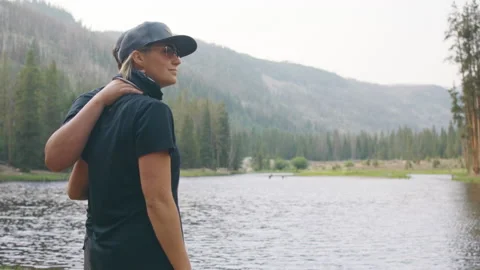 Couple standing at the lake Video stock 167768975