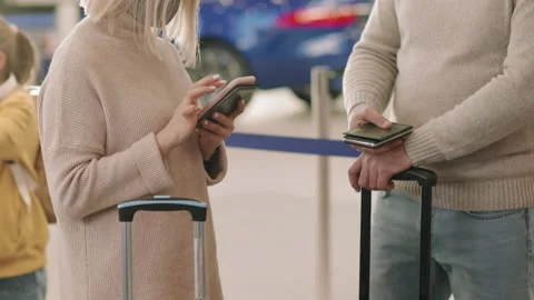 Couple Standing In Queue For Check-In Stock Footage 147458474