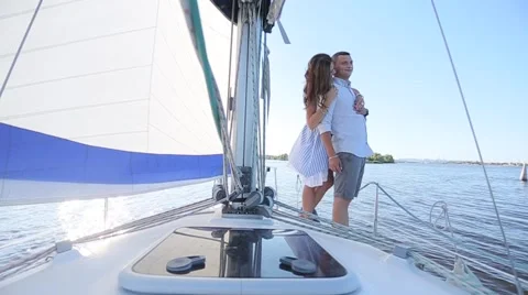 Couple standing on a yacht Stock Footage 68356002