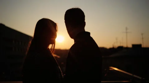 Couple staying on the balcony and spending calm evening together Stock Footage 61844149