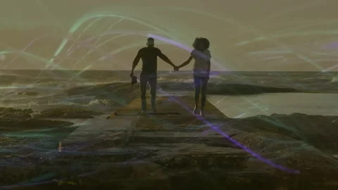 Couple stepping onto jetty and walking hand in hand for travel, exchanging Video stock 317741604