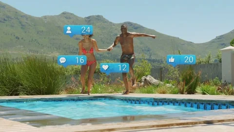 Couple stepping at pool edge, sparking likes and hearts rising for social reach Stock Footage 332804479