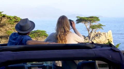Couple Stops at Lone Cypress Tracking Shot Stock Footage 80962088