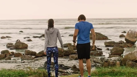 Couple stretching after workout Stock Footage 76521752