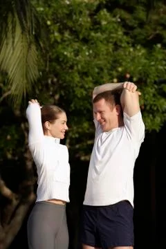 Couple stretching before run Stock Photos