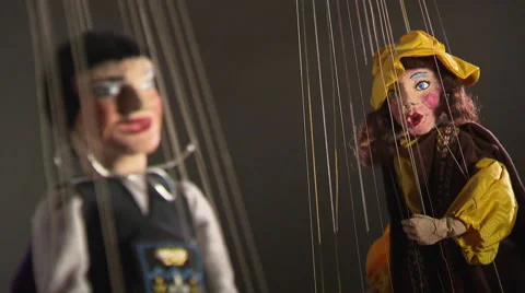 Couple of string puppets (rack focus) Video stock 58662209