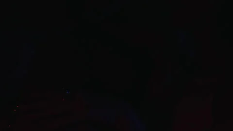 Couple stroking each other's hands in neon light Stock Footage 169625567