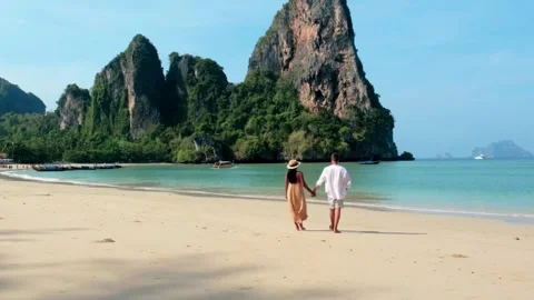 Couple Strolling on a Beach in Krabi Stock Footage 303115611
