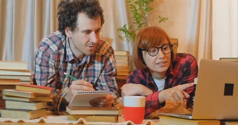 Couple of students with books Stock Footage 127037729