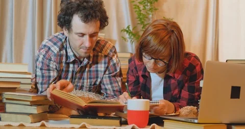 Couple of students with books Stock Footage 127037860