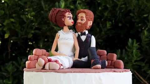Couple of Sugar Wedding Dolls Stock Footage