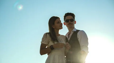 Couple at sunset in the sun Stock Footage 54657808