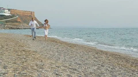 Couple On Sunset: Two Frames Stock Footage 22330157