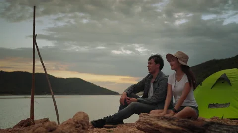 Couple survivalists couple chatting while camping en route to destination Stock-Footage 161053545