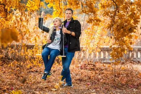 Couple on swing Stock Photos